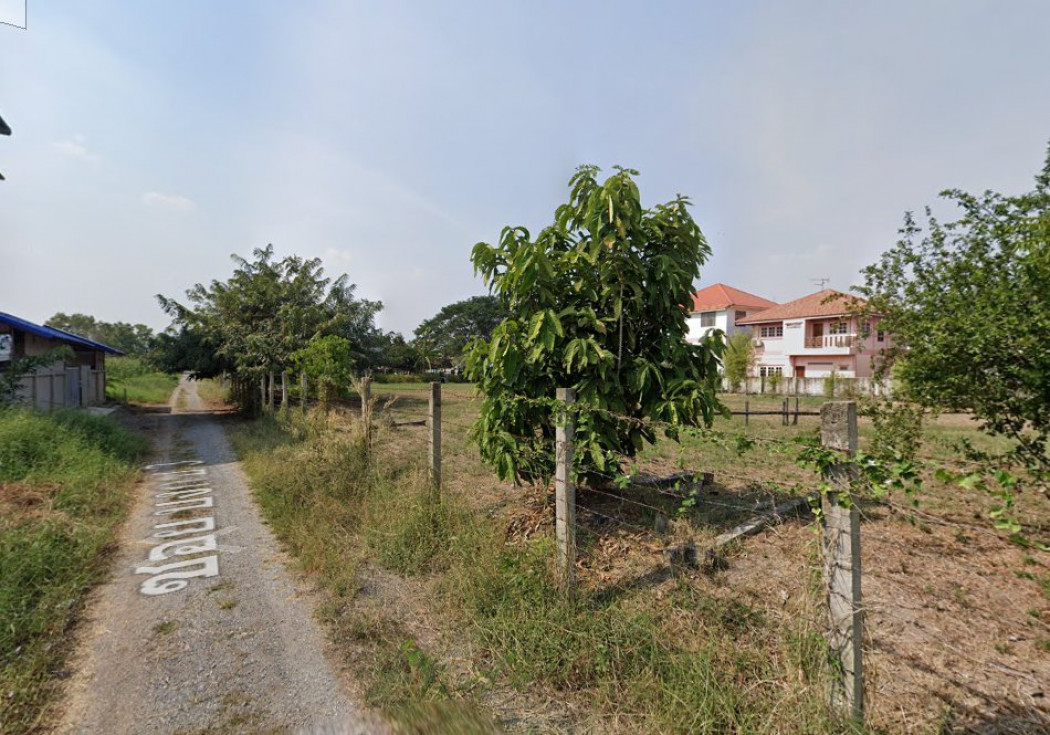 SaleLand Land for sale in Talat Thai area, 2 rai, behind Khlong Luang Market. Next to the road on 2 sides,