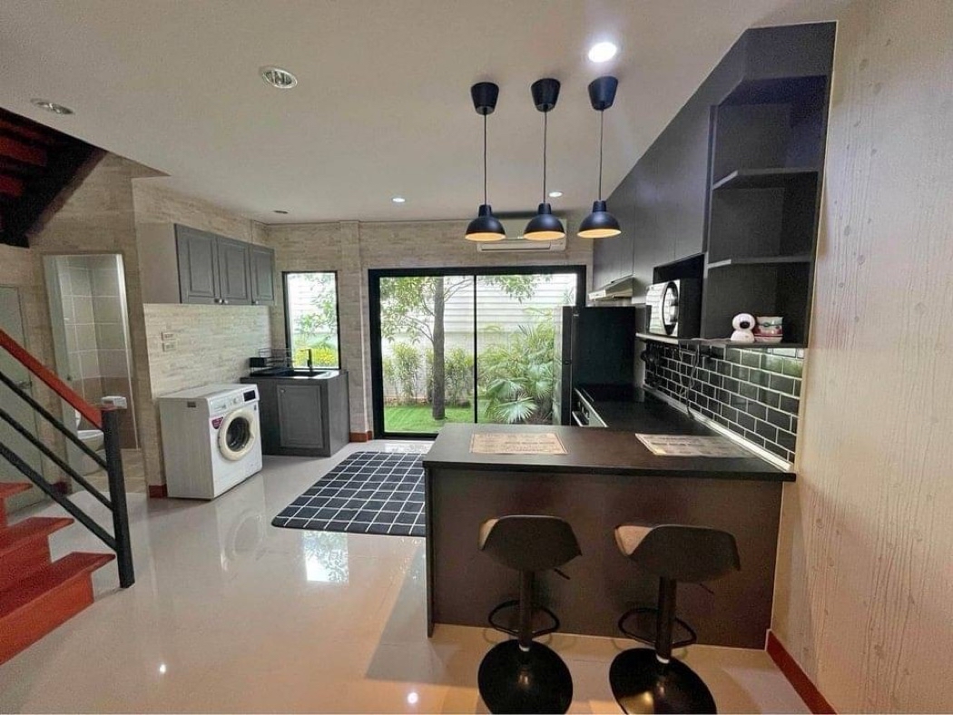 SaleHouse Townhome for sale, beautifully renovated house. Fully built-in furniture, Buathong Thani Phase 18, 101 sq m., 21 sq m, decorated garden in front and back of the house.