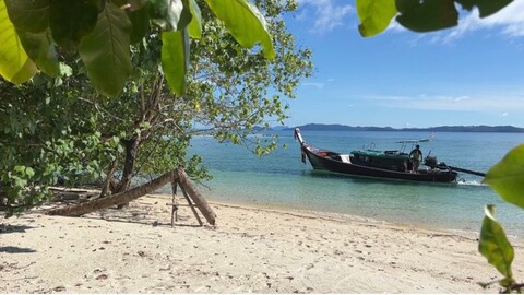 SaleLand  Beach front land 18 Rai Naka Yai Island, Phuket.