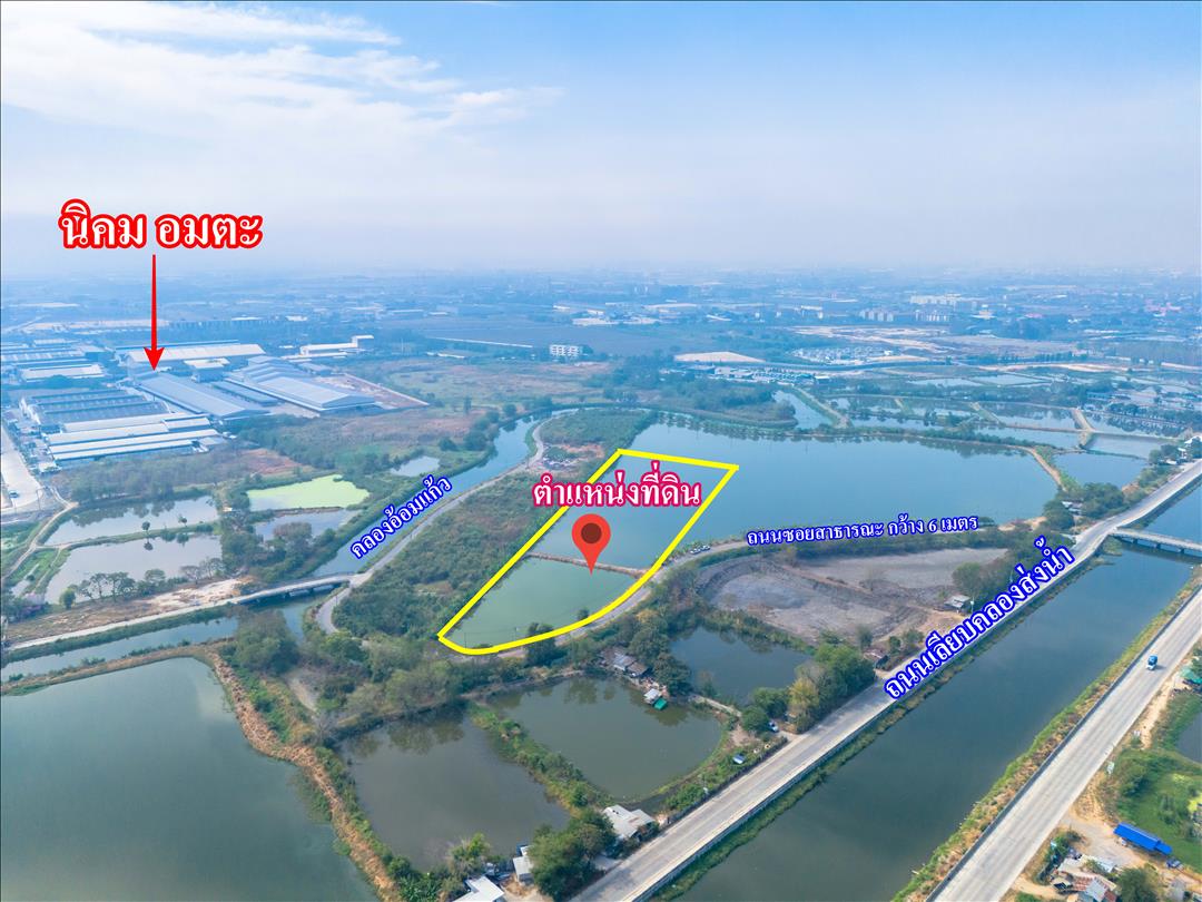 ขายที่สีม่วง อีอีซี 10 ไร่เศษ  ใกล้ถนนเลียบมอเตอร์เวย์สาย 7 ใกล้นิคมอมตะ พานทอง ต.บางนาง อ.พานทอง จ.